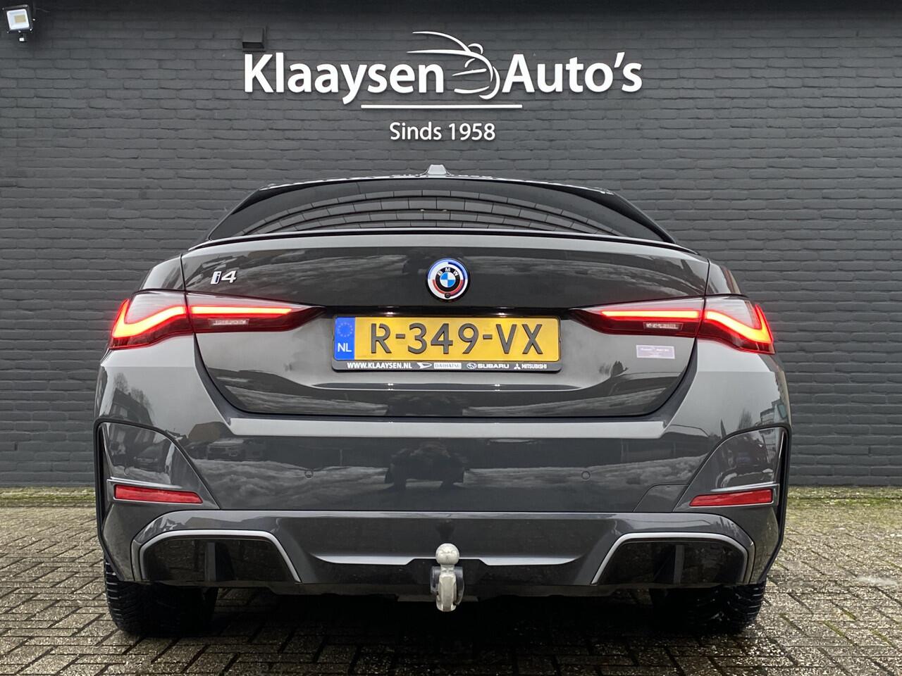 BMW i4 eDrive40 340 pk 84 kWh M-Sport SOH 94.48% | 1e eigenaar | dealer onderhouden | trekhaak | schuifdak | navigatie | BTW