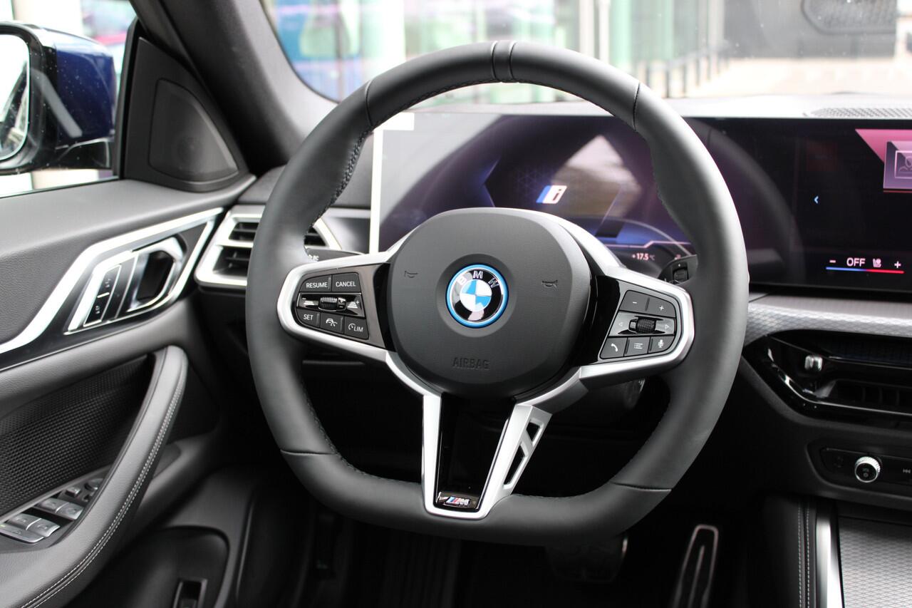 BMW i4 eDrive35 M Sport / Schuif-kanteldak / Achteruitrijcamera / Active Cruise Control / Comfort Access / Adaptieve LED / Stuurverwarming /