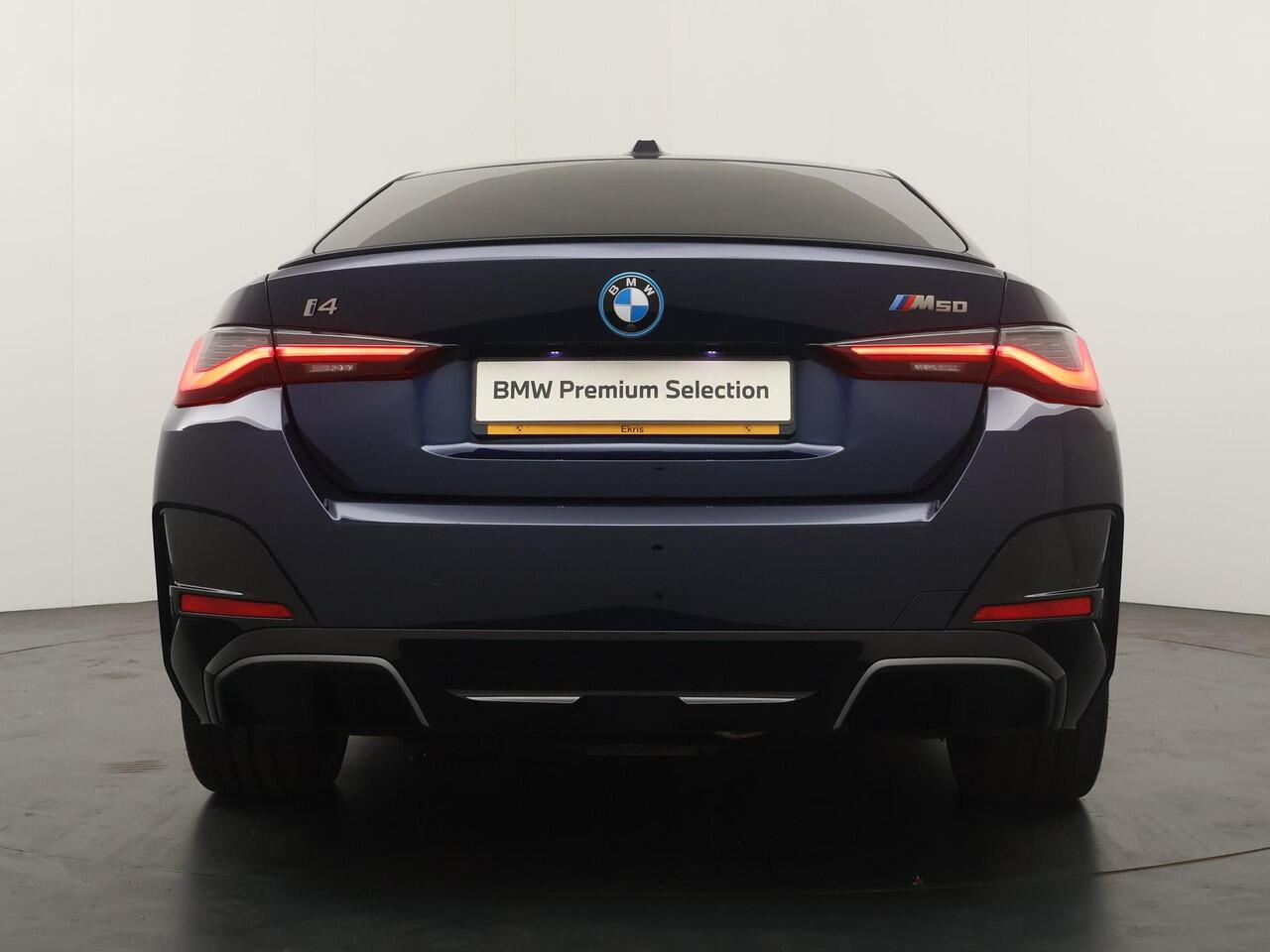 BMW i4 M50 High Executive 84 kWh | Driving Assistant Professional | Trekhaak | Harman Kardon |