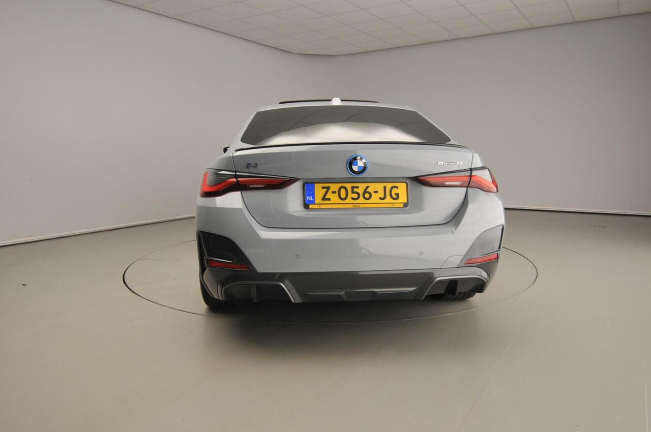 BMW i4 Gran Coupé eDrive35 M-Sportpakket | LED | Leder | HUD | Schuifdak | Active cruise | Sportstoelen | DAB | Hifi speakers | Alu 18 inch