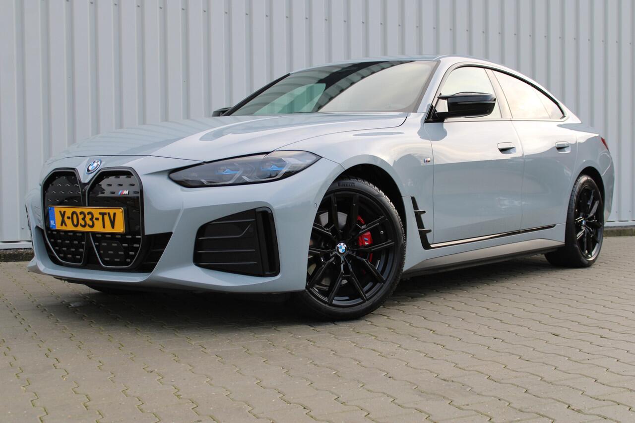 BMW i4 M50 High Executive 84 kWh | Incl. 12 maanden garantie | Assisted driving | Climate control | 360° camera | Uitklapbare trekhaak | Stoel/stuurverwarming | Head-up display | Schuif/kantel dak |