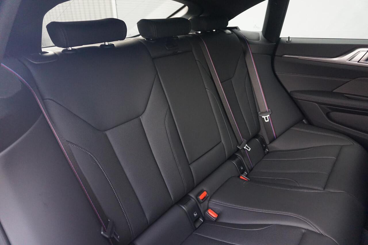 BMW i4 eDrive40 M Sport Pro | Elektrisch schuif-kanteldak / Memory Stoelen / Harman Kardon / Comfort Access / Stoel & Stuurwiel verwarming