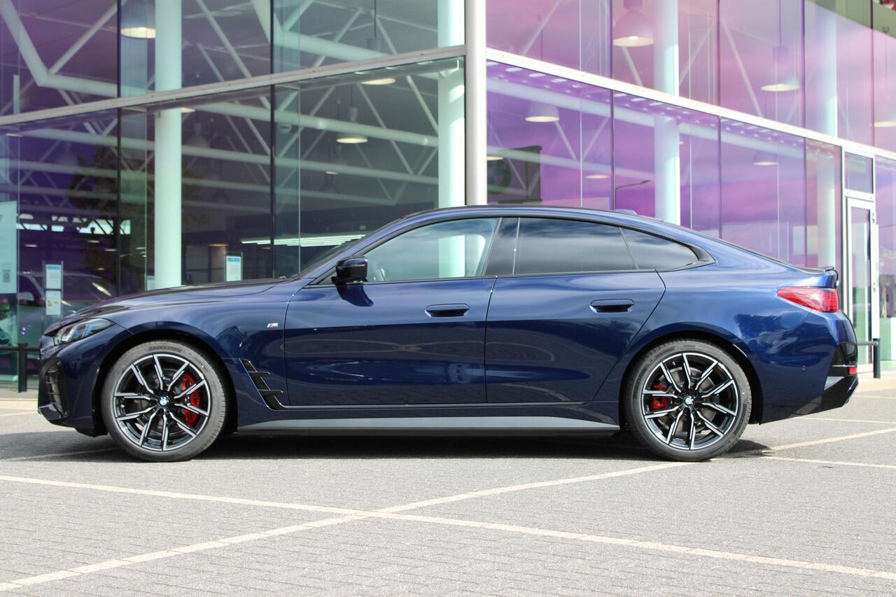 BMW i4 eDrive35 M Sport / Schuif-kanteldak / Achteruitrijcamera / Active Cruise Control / Comfort Access / Adaptieve LED / Stuurverwarming /