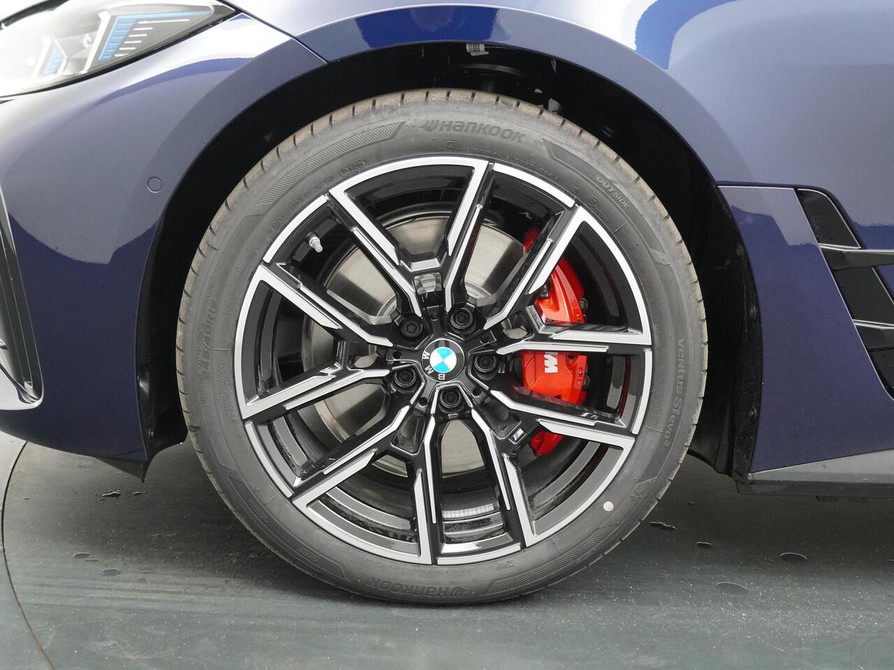 BMW i4 eDrive40 84 kWh M-Sport Pro | Trakhaak | Adaptive Cruise | HiFi | Comfort Access |