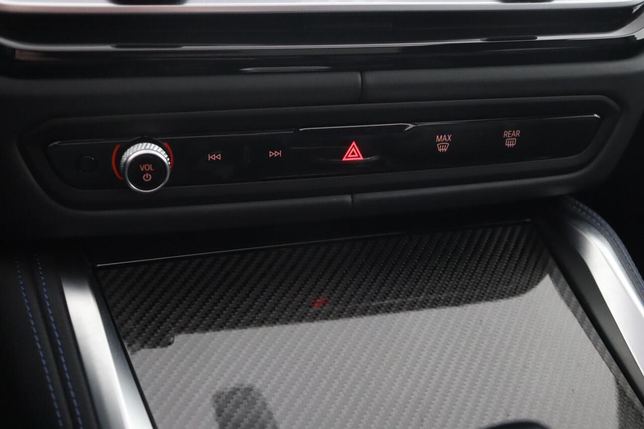 BMW i4 M50 High Executive 84 kWh | Schuif-/kanteldak | Adaptief M Onderstel | Comfort Access | Driving Assistant Professional | Stuur- en stoelverwarming | Laserlight | Carbon Interieur |