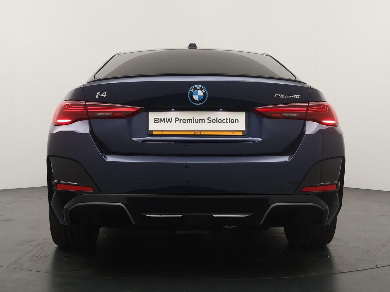 BMW i4 eDrive40 84 kWh M-Sport Pro | Trakhaak | Adaptive Cruise | HiFi | Comfort Access |