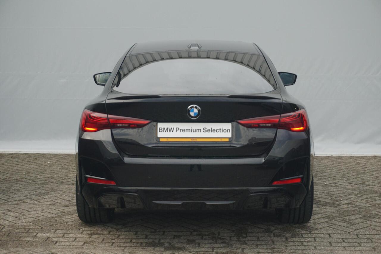 BMW i4 eDrive40 M Sport Pro | Elektrisch schuif-kanteldak / Memory Stoelen / Harman Kardon / Comfort Access / Stoel & Stuurwiel verwarming