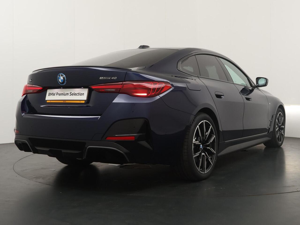 BMW i4 eDrive40 84 kWh M-Sport Pro | Trakhaak | Adaptive Cruise | HiFi | Comfort Access |