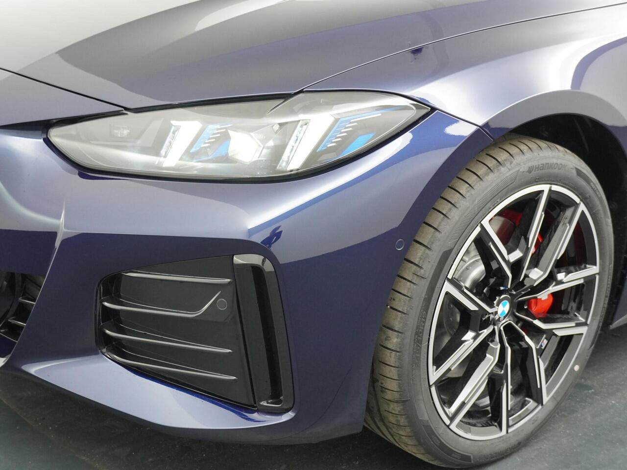 BMW i4 eDrive40 84 kWh M-Sport Pro | Trakhaak | Adaptive Cruise | HiFi | Comfort Access |