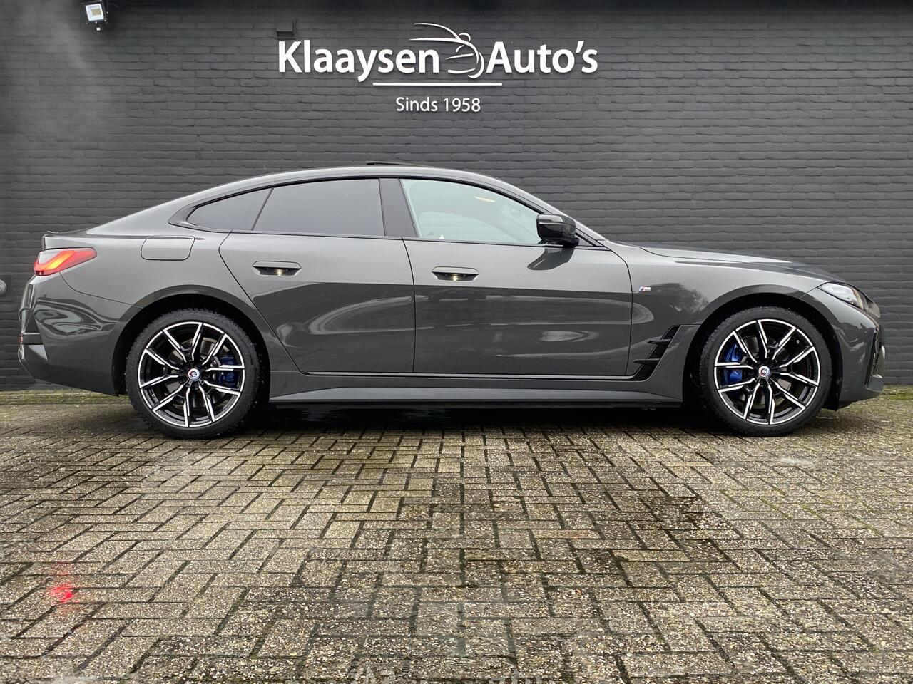 BMW i4 eDrive40 340 pk 84 kWh M-Sport SOH 94.48% | 1e eigenaar | dealer onderhouden | trekhaak | schuifdak | navigatie | BTW
