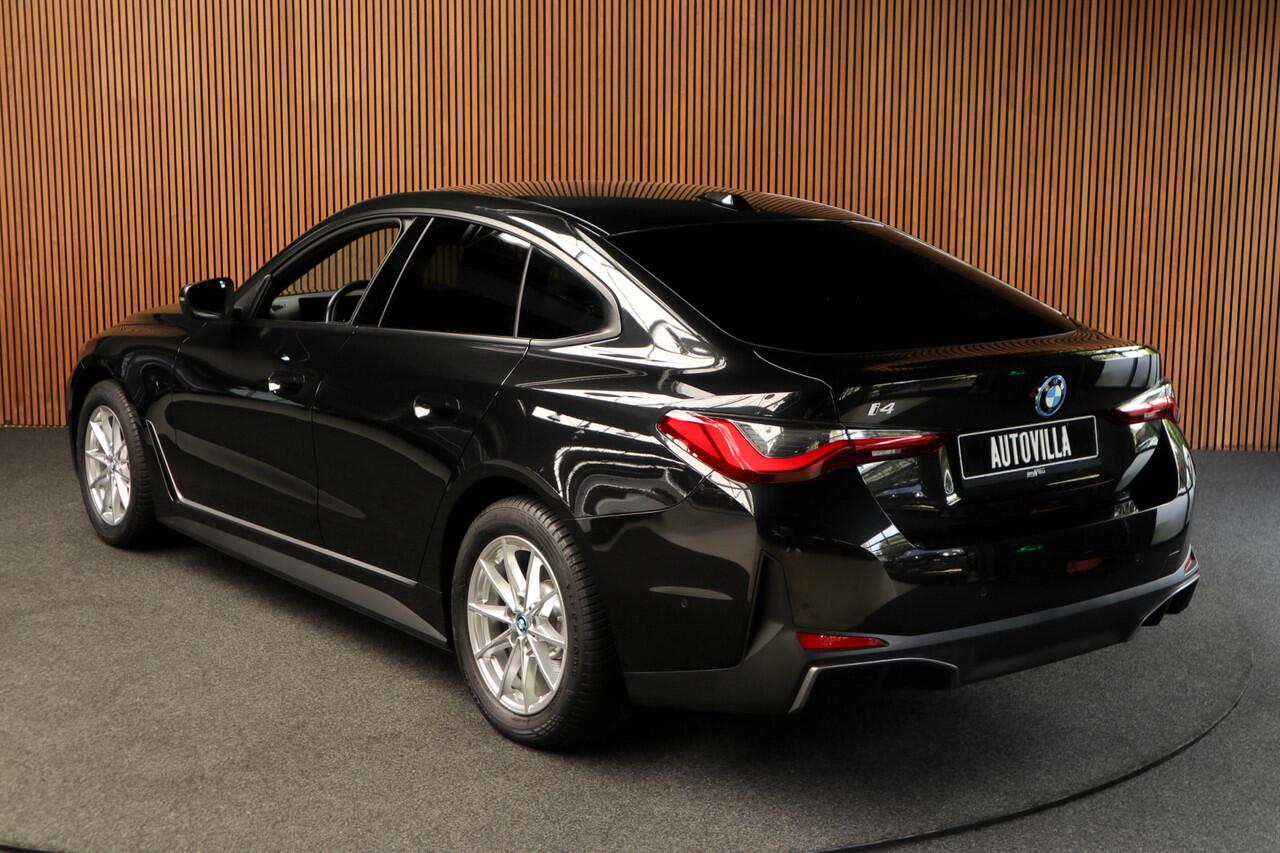 BMW i4 eDrive40 84 kWh M-pakket Navi Leer Elektr. achterklep 360° Camera Co-pilot Climate voor & achter Zwarte hemelbekleding PDC LM velgen BTW auto