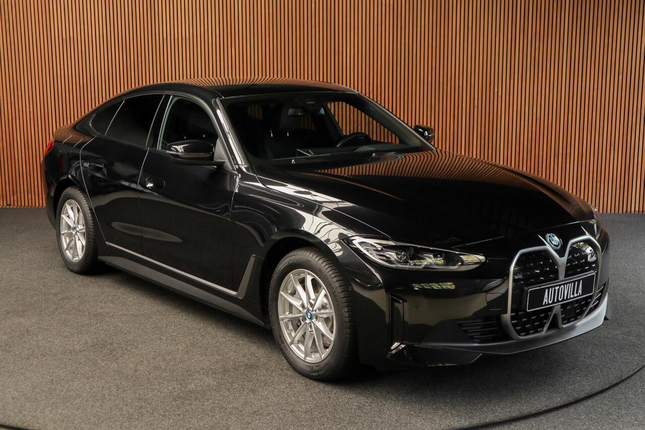 BMW i4 eDrive40 84 kWh M-pakket Navi Leer Elektr. achterklep 360° Camera Co-pilot Climate voor & achter Zwarte hemelbekleding PDC LM velgen BTW auto