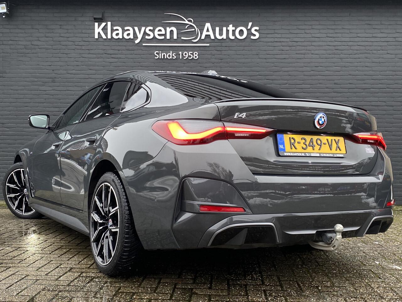 BMW i4 eDrive40 340 pk 84 kWh M-Sport SOH 94.48% | 1e eigenaar | dealer onderhouden | trekhaak | schuifdak | navigatie | BTW