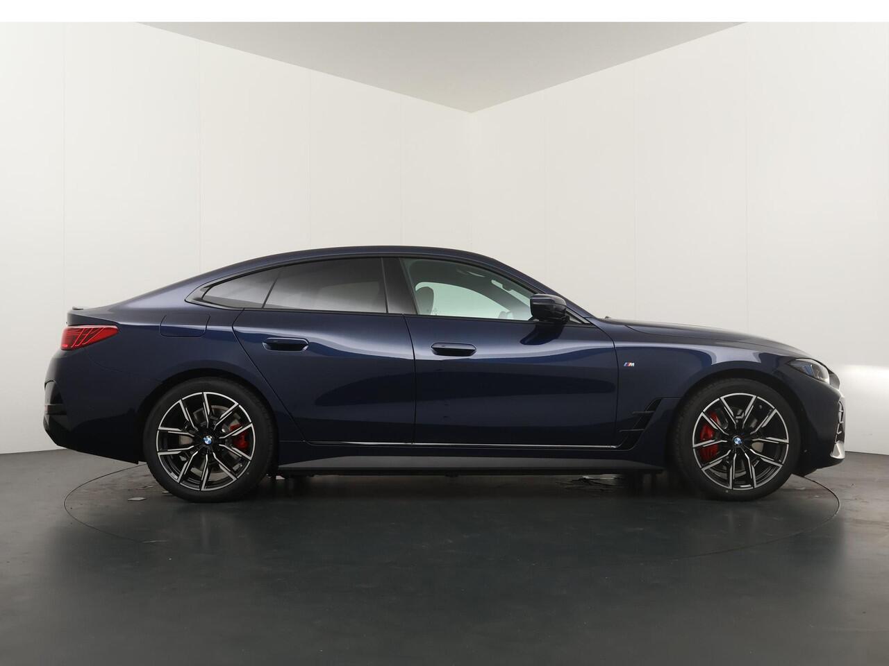 BMW i4 eDrive40 84 kWh M-Sport Pro | Trakhaak | Adaptive Cruise | HiFi | Comfort Access |