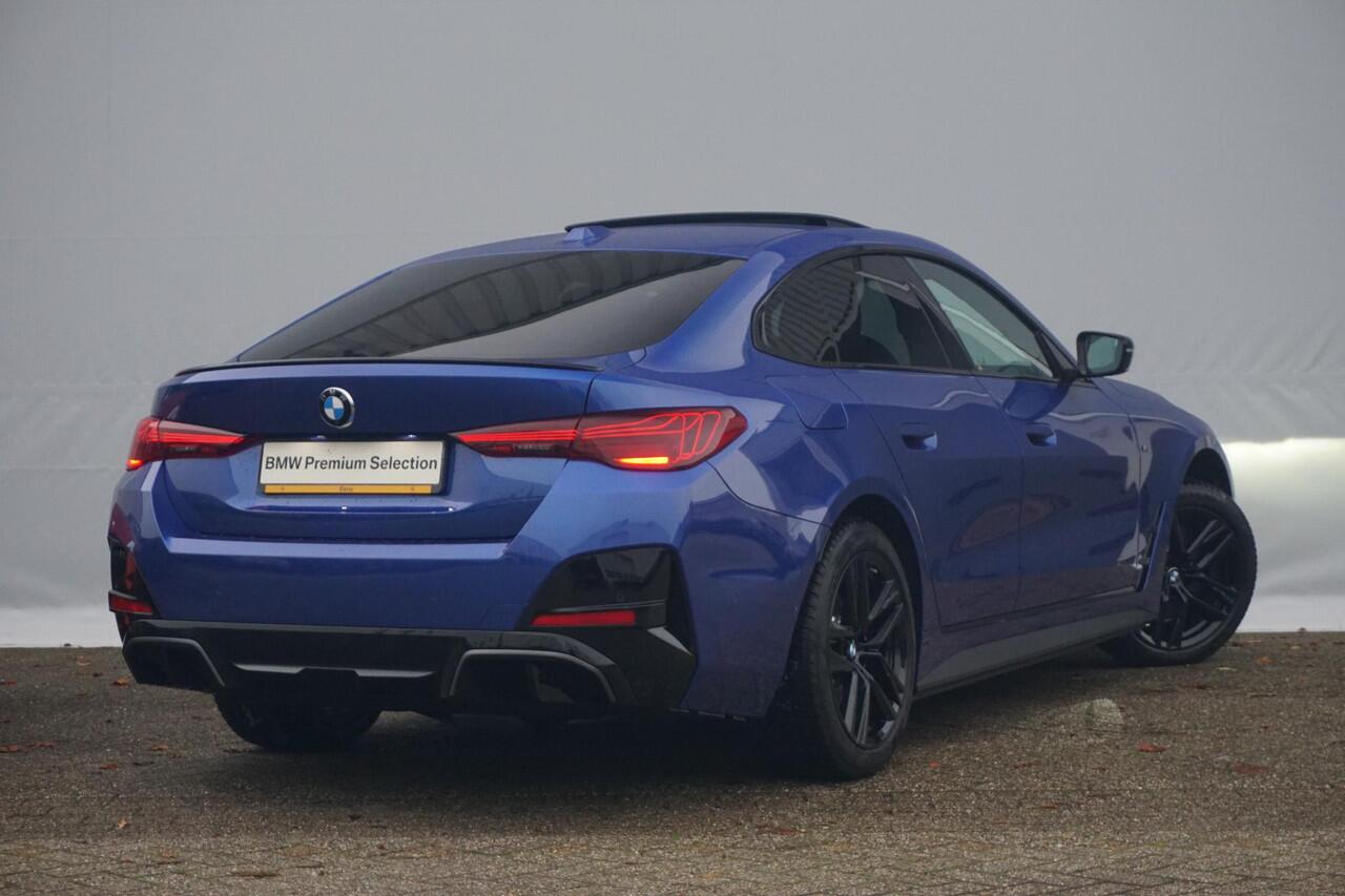 BMW i4 eDrive40 M Sportpakket Pro Schuif-/kanteldak / Active Cruise Control / Verwarmde stoelen voor en achter / Comfort Access