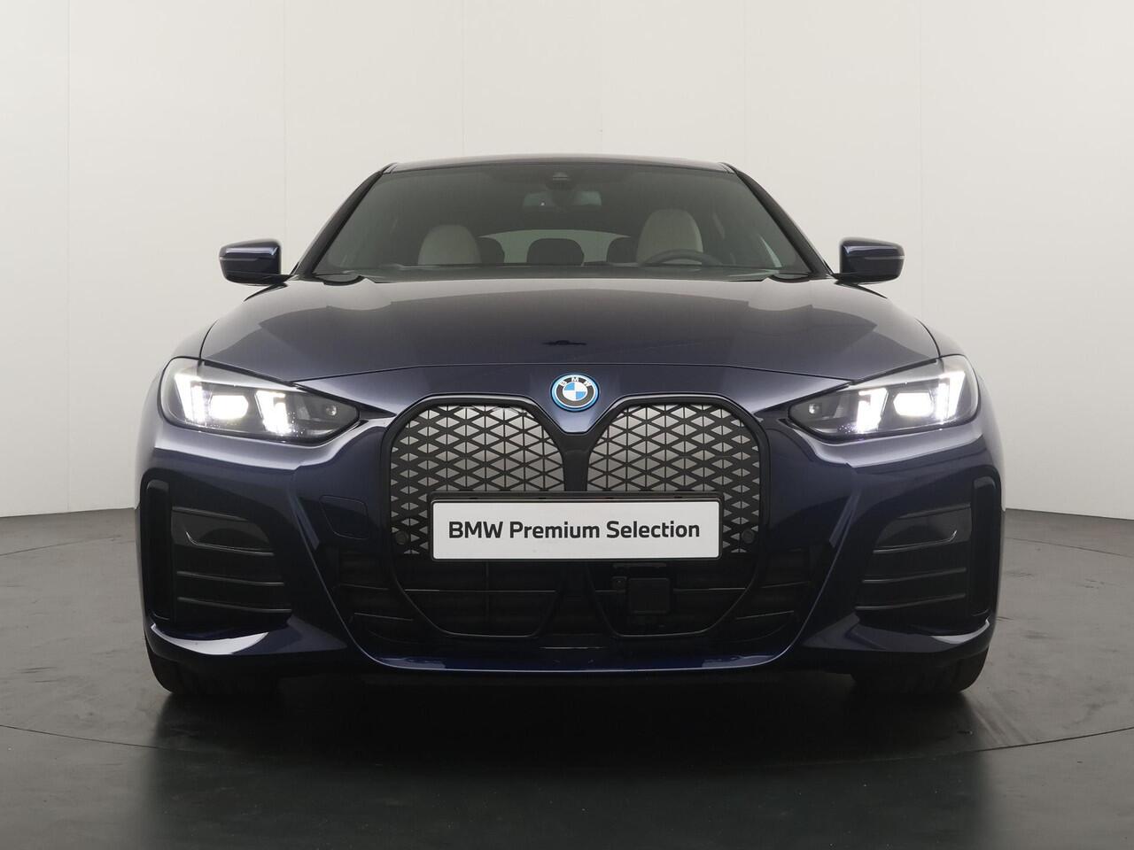 BMW i4 eDrive40 84 kWh M-Sport Pro | Trakhaak | Adaptive Cruise | HiFi | Comfort Access |