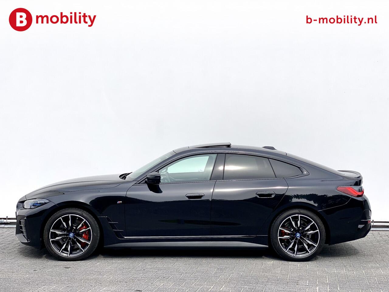 BMW i4 M50 544Pk High Executive 84 kWh Elektrisch verstelbare stoelen | Trekhaak 1600kg | Schuif/Kanteldak | Driving Assistant Professional | Harman Kardon Sound System | Head Up Display | Verwarmbaar stuurwiel | Interieurlijsten Carbon Fibre | Parking Assist.