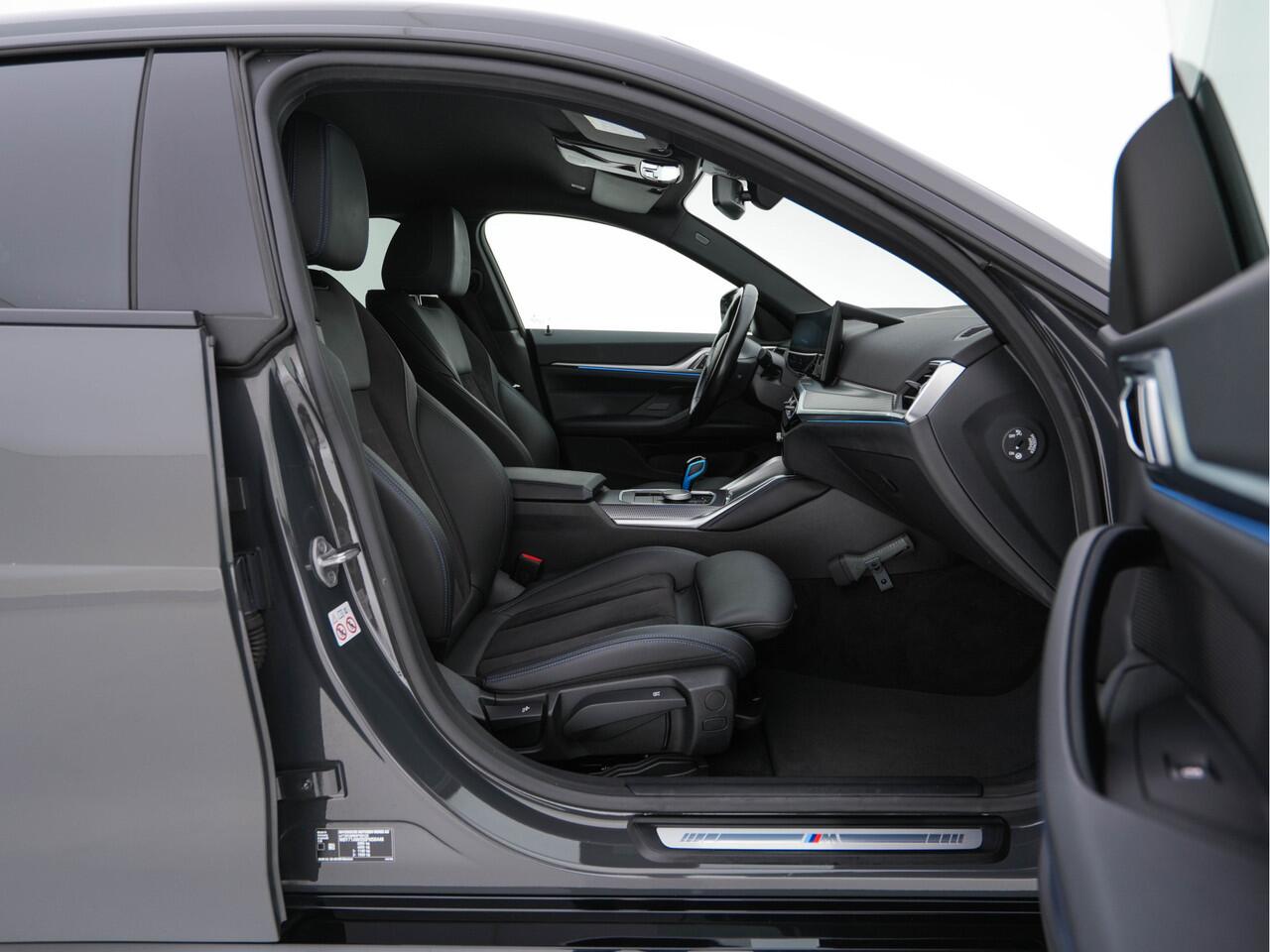 BMW i4 eDrive40 84 kWh M-Sportpack [ 3-Fase ] { SOH-95%} (INCL-BTW) *LEATHER-ALCANTARA | FULL-LED | ADAPTIVE-CRUISE | WIDE-SCREEN-DIGI-COCKPIT | DAB+ | CAMERA | AMBIENT-LIGHT | CARPLAY | SPORT-SEATS | PRIVACY-GLASS | TOWBAR | 18''ALU*