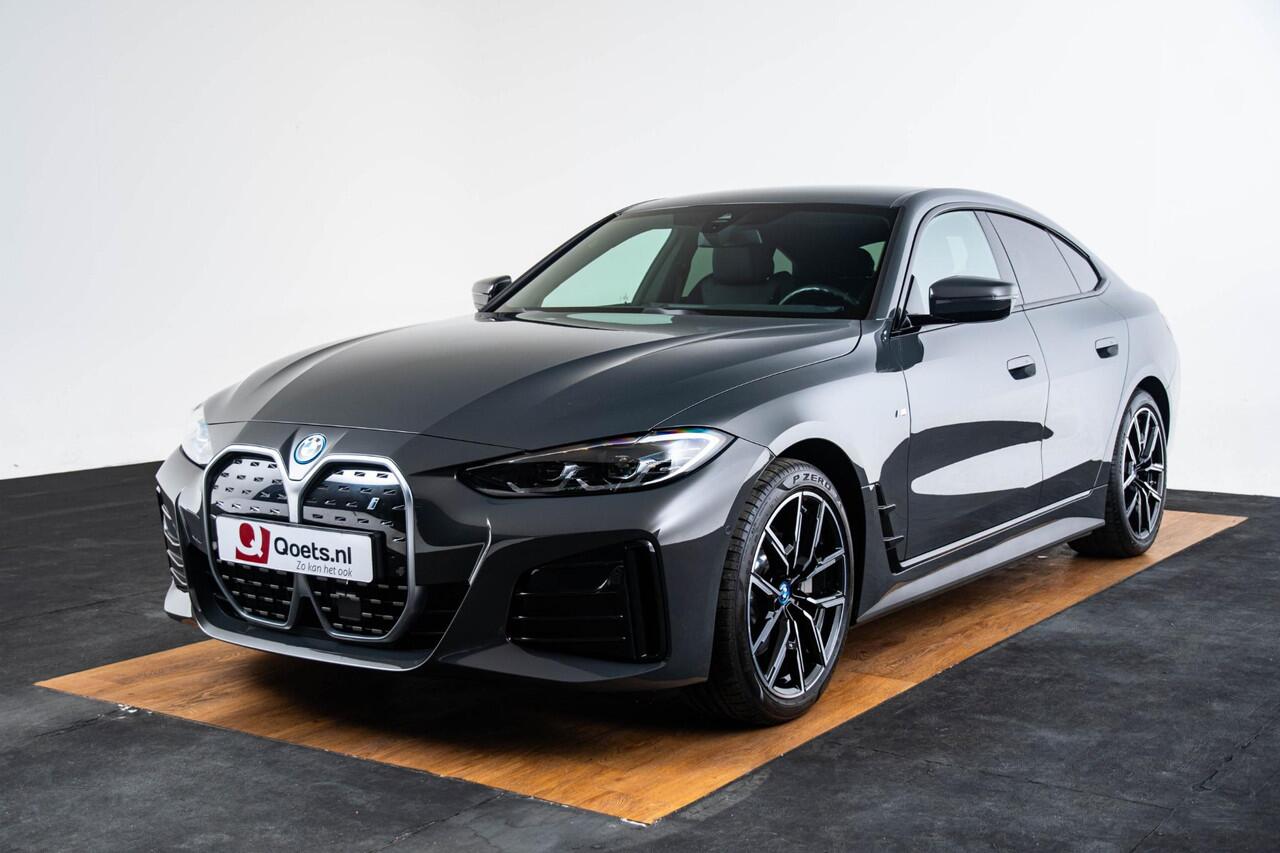 BMW i4 eDrive40 84 kWh M Sport - Trekhaak - Elektrisch verwarmde voorstoelen - Active Cruise Control - Getinte Ruiten - Comfort Access - Hifi - Ambiance verlichting - Live Cockpit Professional - IconicSounds Electric -