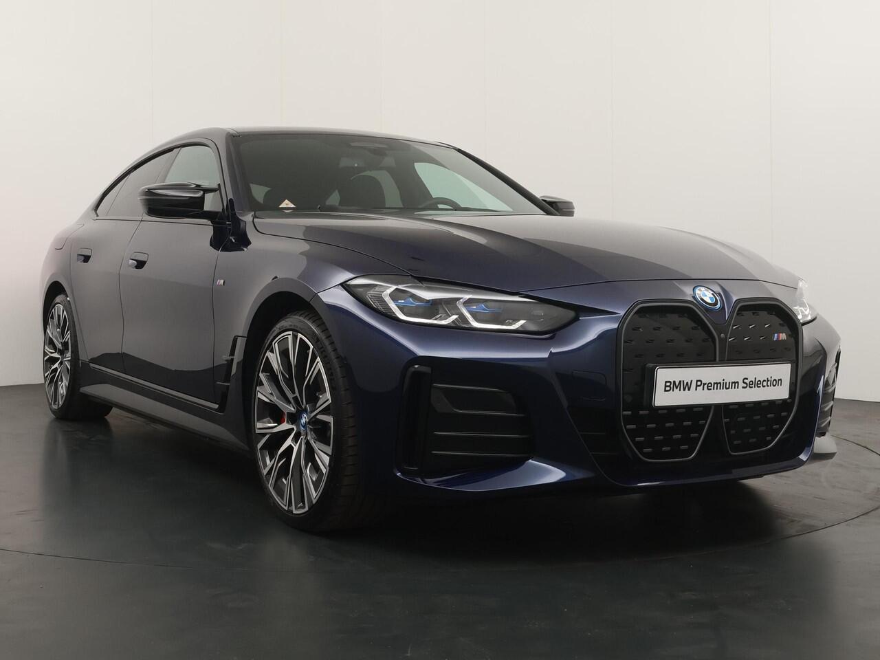 BMW i4 M50 High Executive 84 kWh | Driving Assistant Professional | Trekhaak | Harman Kardon |