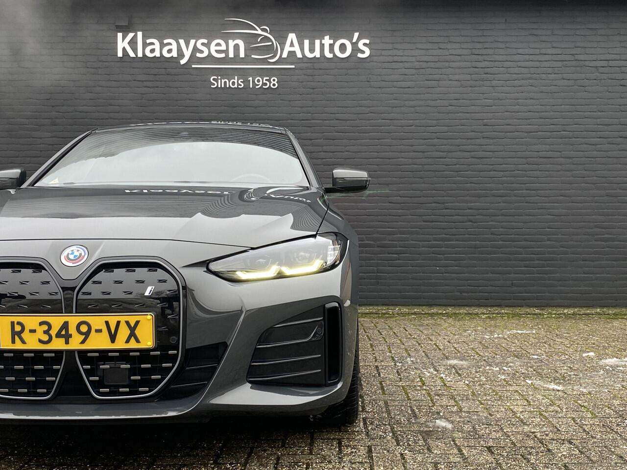 BMW i4 eDrive40 340 pk 84 kWh M-Sport SOH 94.48% | 1e eigenaar | dealer onderhouden | trekhaak | schuifdak | navigatie | BTW