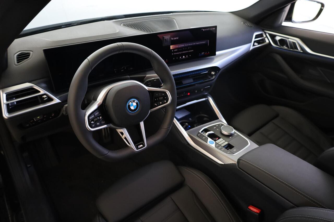 BMW i4 eDrive40 M Sportpakket Pro | Schuif-kantel dak | Active Cruise Control
