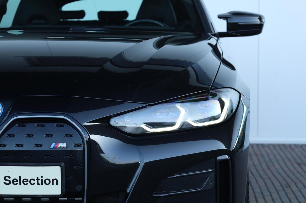 BMW i4 M50 High Executive 84 kWh M Sportpakket Pro/ Verwarmd Stuurwiel/ Comfort Access/ Harman-Kardon/ Driving Assistant Professional/ M Sportstoelen