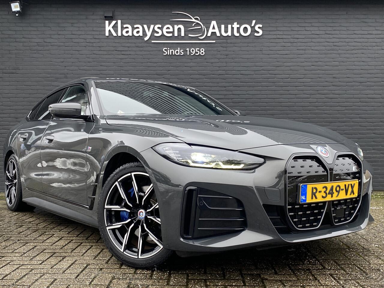 BMW i4 eDrive40 340 pk 84 kWh M-Sport SOH 94.48% | 1e eigenaar | dealer onderhouden | trekhaak | schuifdak | navigatie | BTW