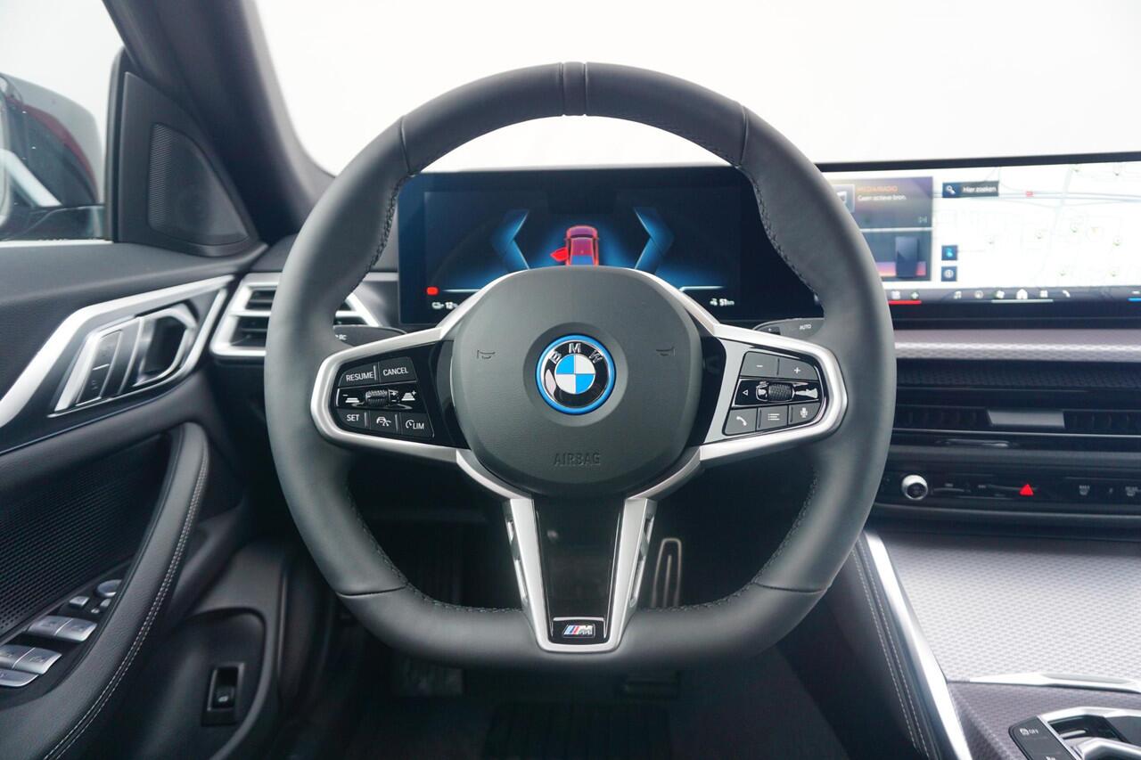 BMW i4 eDrive35 M sportpakket Pro Schuif-/kanteldak / Comfort Access / Active Cruise Control / Stuur-stoelverwarming / Ekris Selection
