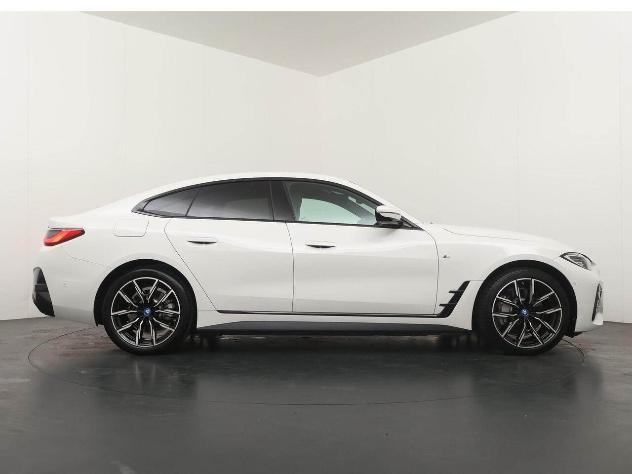 BMW i4 eDrive40 High Executive 84 kWh | M Sportpakket | Opendak |