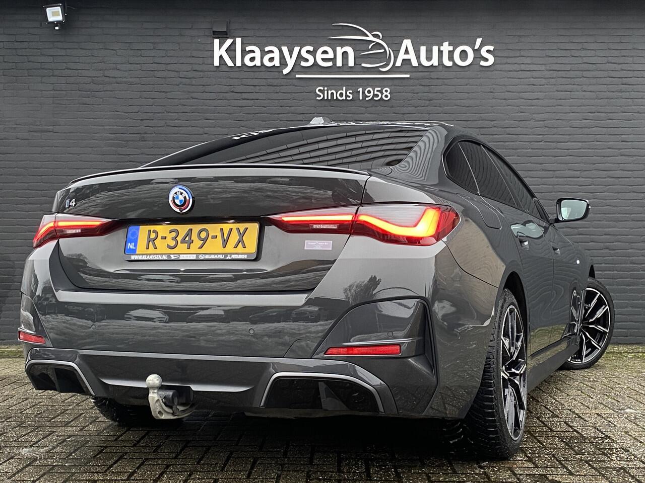 BMW i4 eDrive40 340 pk 84 kWh M-Sport SOH 94.48% | 1e eigenaar | dealer onderhouden | trekhaak | schuifdak | navigatie | BTW