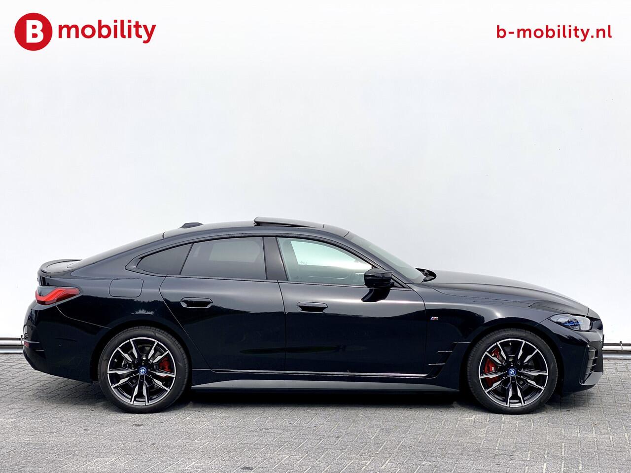 BMW i4 M50 544Pk High Executive 84 kWh Elektrisch verstelbare stoelen | Trekhaak 1600kg | Schuif/Kanteldak | Driving Assistant Professional | Harman Kardon Sound System | Head Up Display | Verwarmbaar stuurwiel | Interieurlijsten Carbon Fibre | Parking Assist.