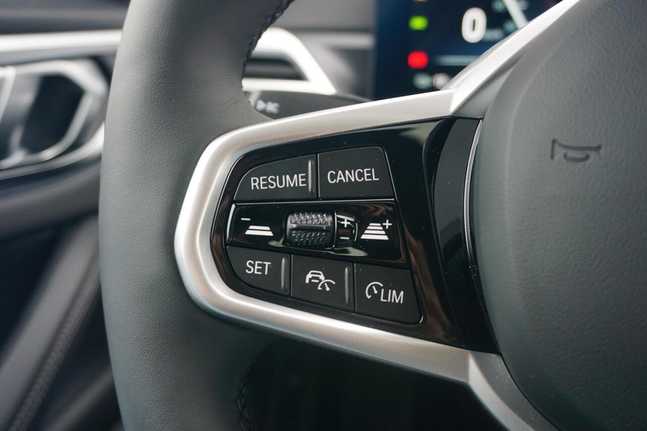 BMW i4 eDrive35 M sportpakket Pro Schuif-/kanteldak / Comfort Access / Active Cruise Control / Stuur-stoelverwarming / Ekris Selection