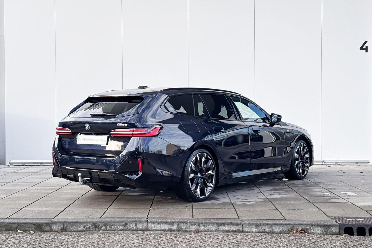 BMW i5 Touring M60 xDrive M-Sport Pro / Harman Kardon Audio / Trekhaak / Driving Prof / 21inch LM Velgen / Head Up Display / Glazendak / Stuurwielrandverwarming / Parking Prof