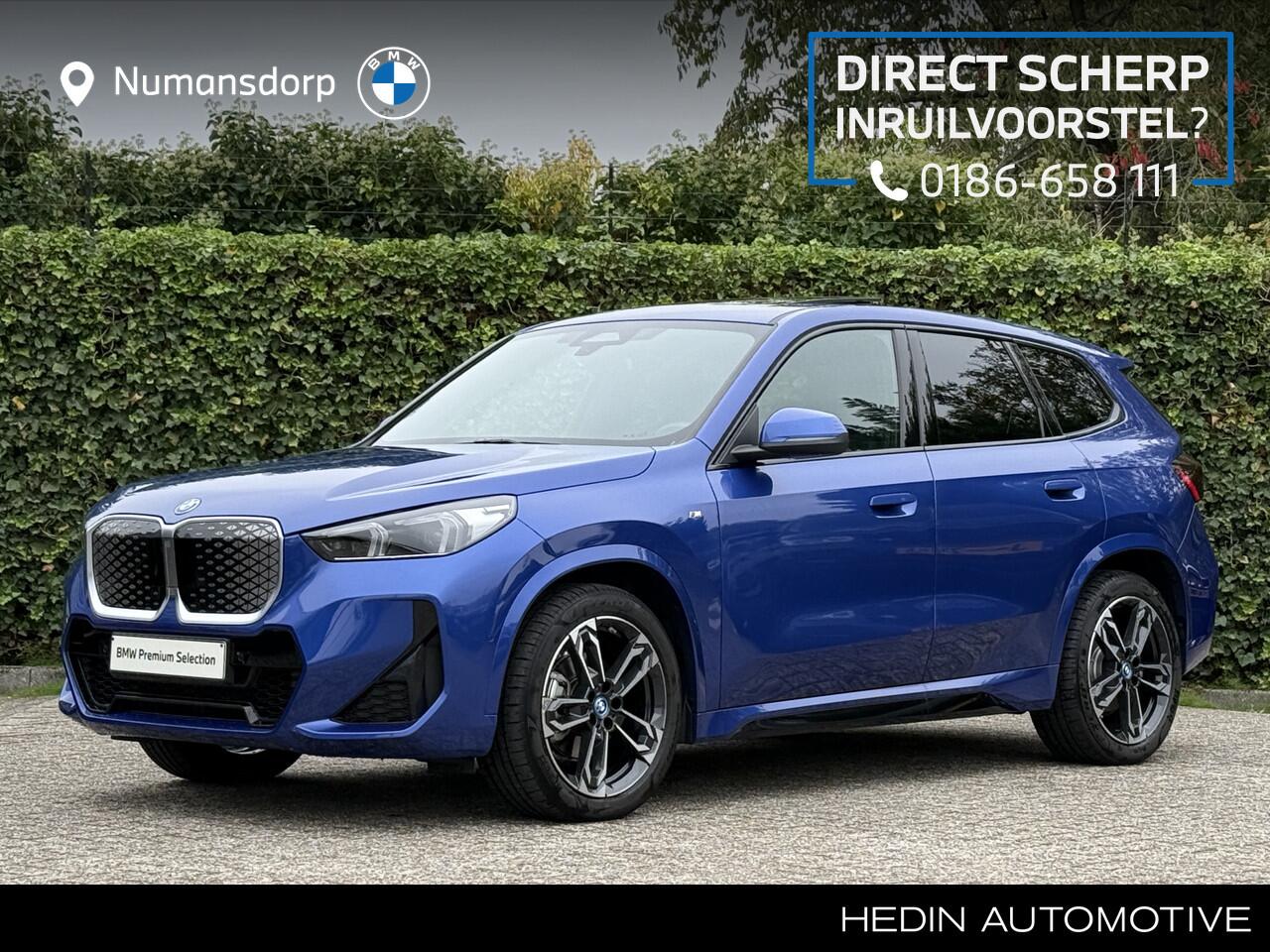 BMW iX1 eDrive20 | M-Sport | 19'' | Panorama | Camera | Stoelverw.