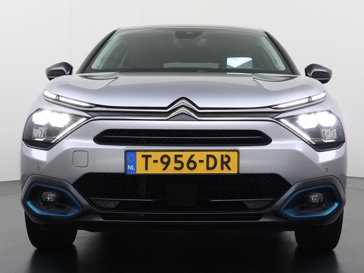 Citroen ë-C4 Shine 50 kWh SOH 98% 3-FASE LADER | stuur + stoel verwarming | trekhaak | head-up display | Camera | keyles start & go | dodehoek | Rijklaar geleverd met 12 maanden BOVAG-garantie