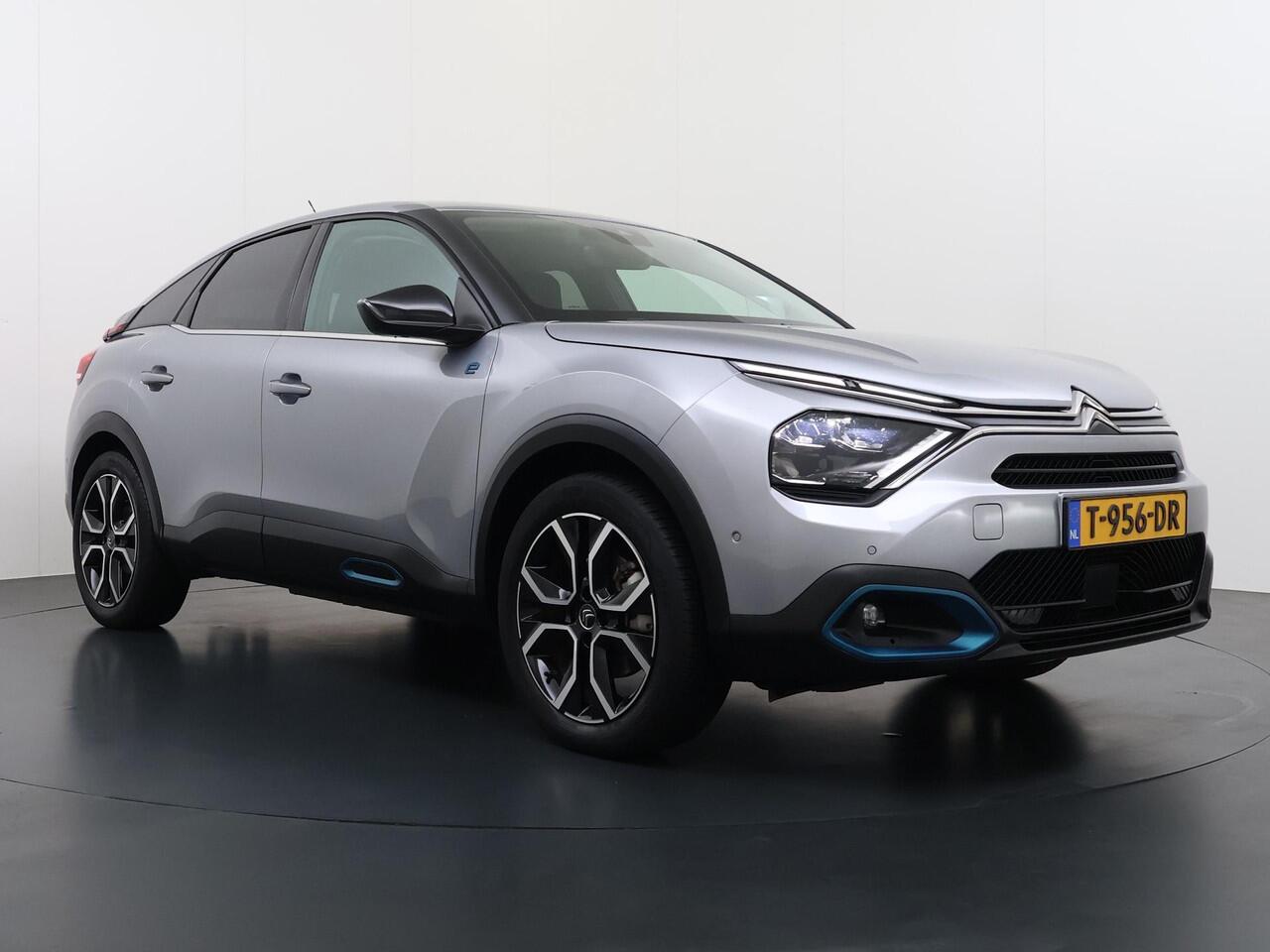 Citroen ë-C4 Shine 50 kWh SOH 98% 3-FASE LADER | stuur + stoel verwarming | trekhaak | head-up display | Camera | keyles start & go | dodehoek | Rijklaar geleverd met 12 maanden BOVAG-garantie