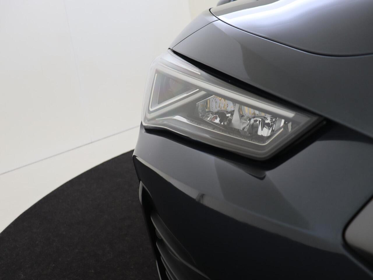 Cupra Leon 1.4 e-Hybrid Business | Parkeerassistent | Adaptieve demping systeem | 3-zone airco | Keyless | Dodehoek detectie | Achteruitrijcamera | Stoel- en stuurwielverwarming | CarPlay |