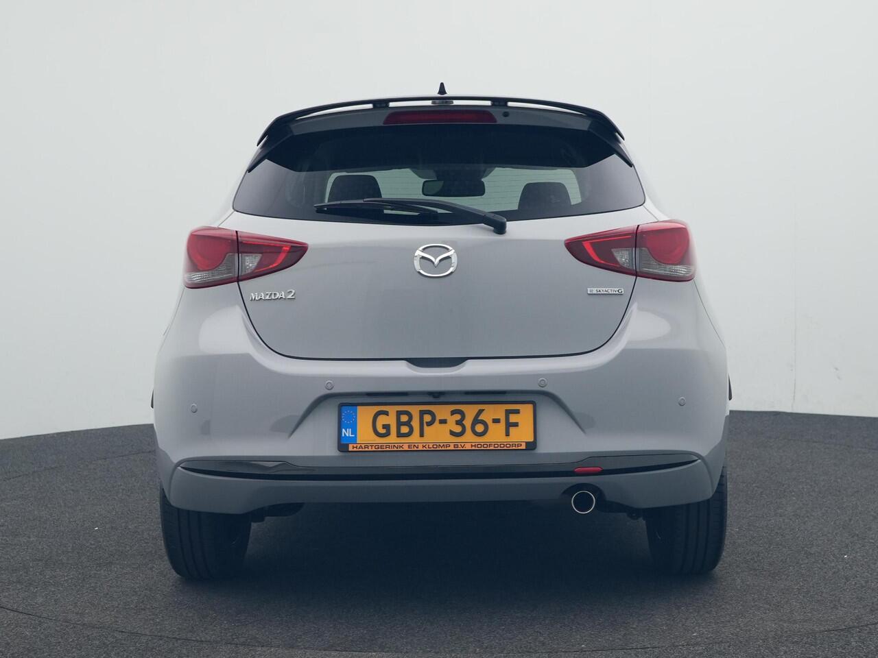 Mazda 2 1.5 e-SkyActiv-G Homura Aka met Driver Assistance pakket en dakspoiler : dealer onderhouden