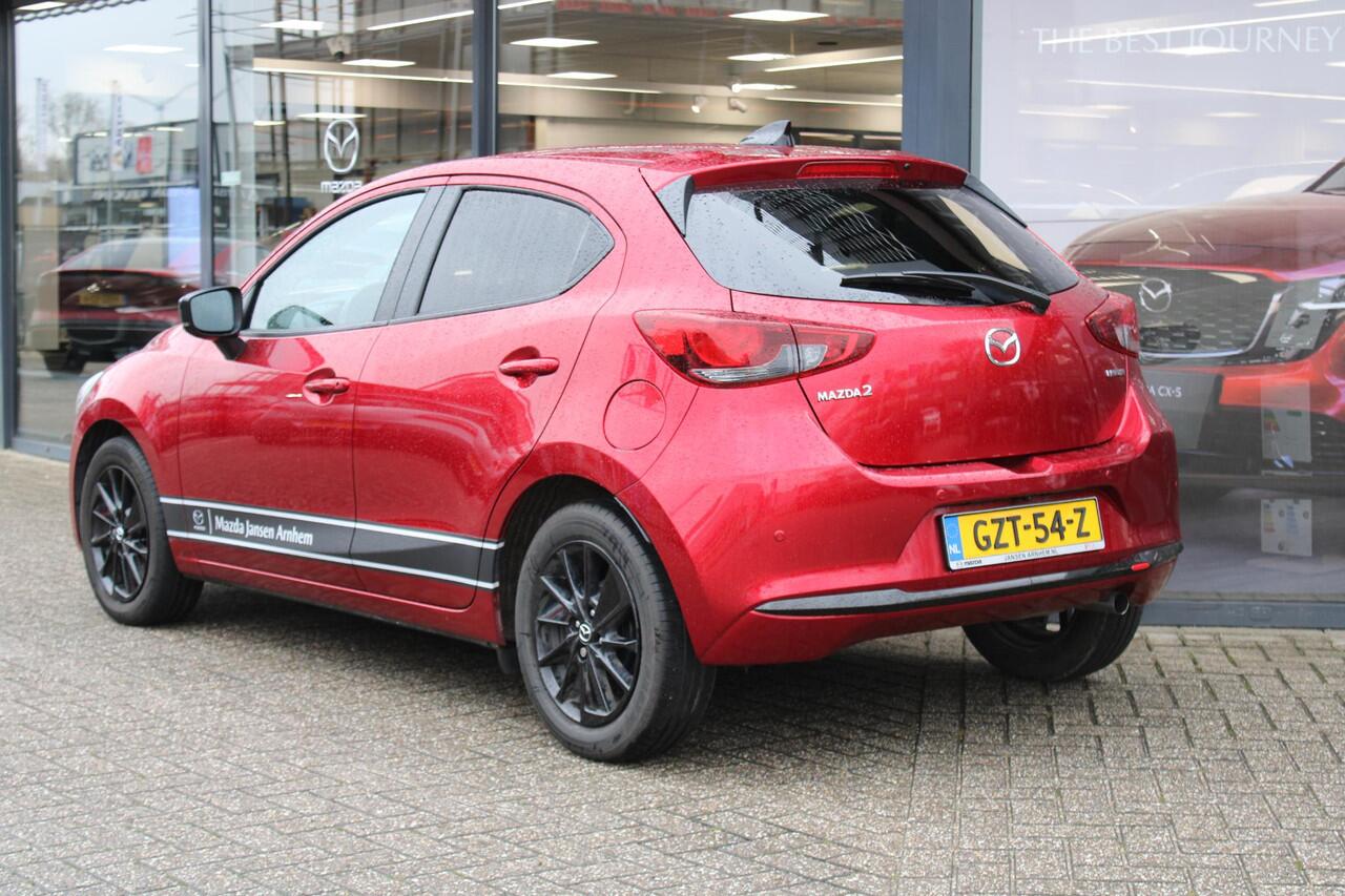 Mazda 2 1.5 e-SkyActiv-G 90 Homura , Demovoordeel ¤4.140-, Apple Carplay, LMV 16 Inch, Camera, PDC, Clima, Cruise, Stuur/Stoelverwarming, BSM, LKA