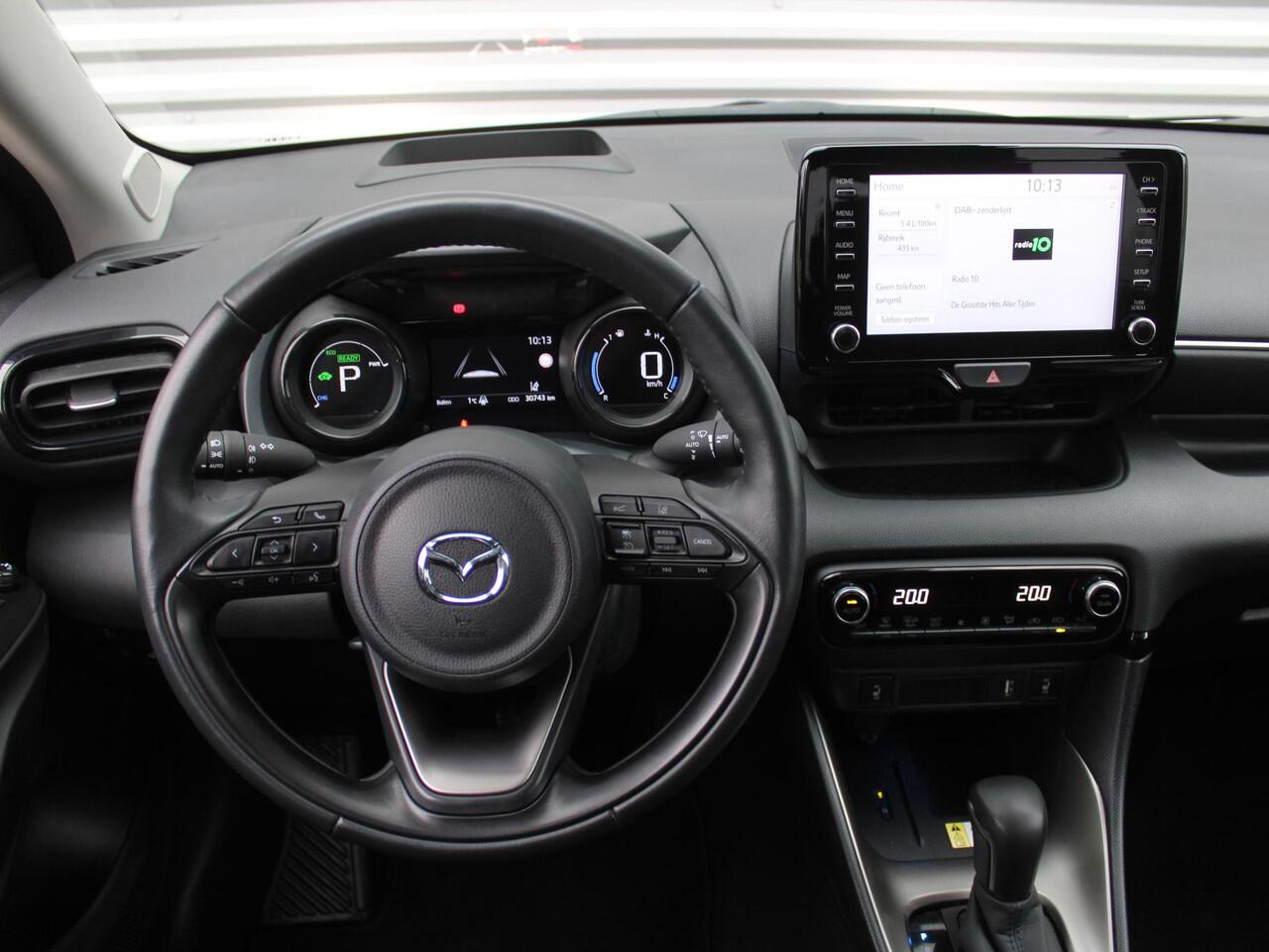 Mazda 2 Hybrid 1.5 Select | 16" LM | Stoel- & stuurverwarming | HUD | Camera | Dodehoek sensor |
