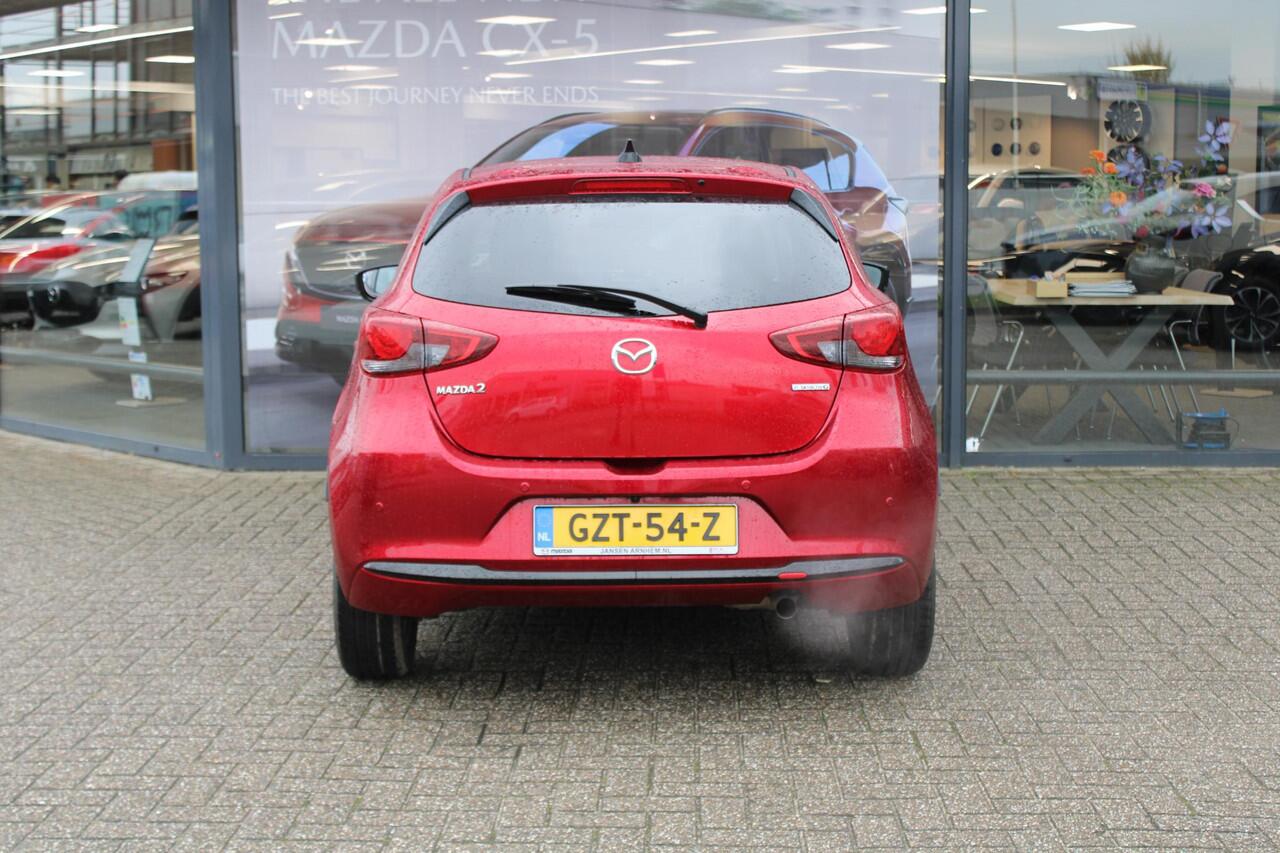 Mazda 2 1.5 e-SkyActiv-G 90 Homura , Demovoordeel ¤4.140-, Apple Carplay, LMV 16 Inch, Camera, PDC, Clima, Cruise, Stuur/Stoelverwarming, BSM, LKA