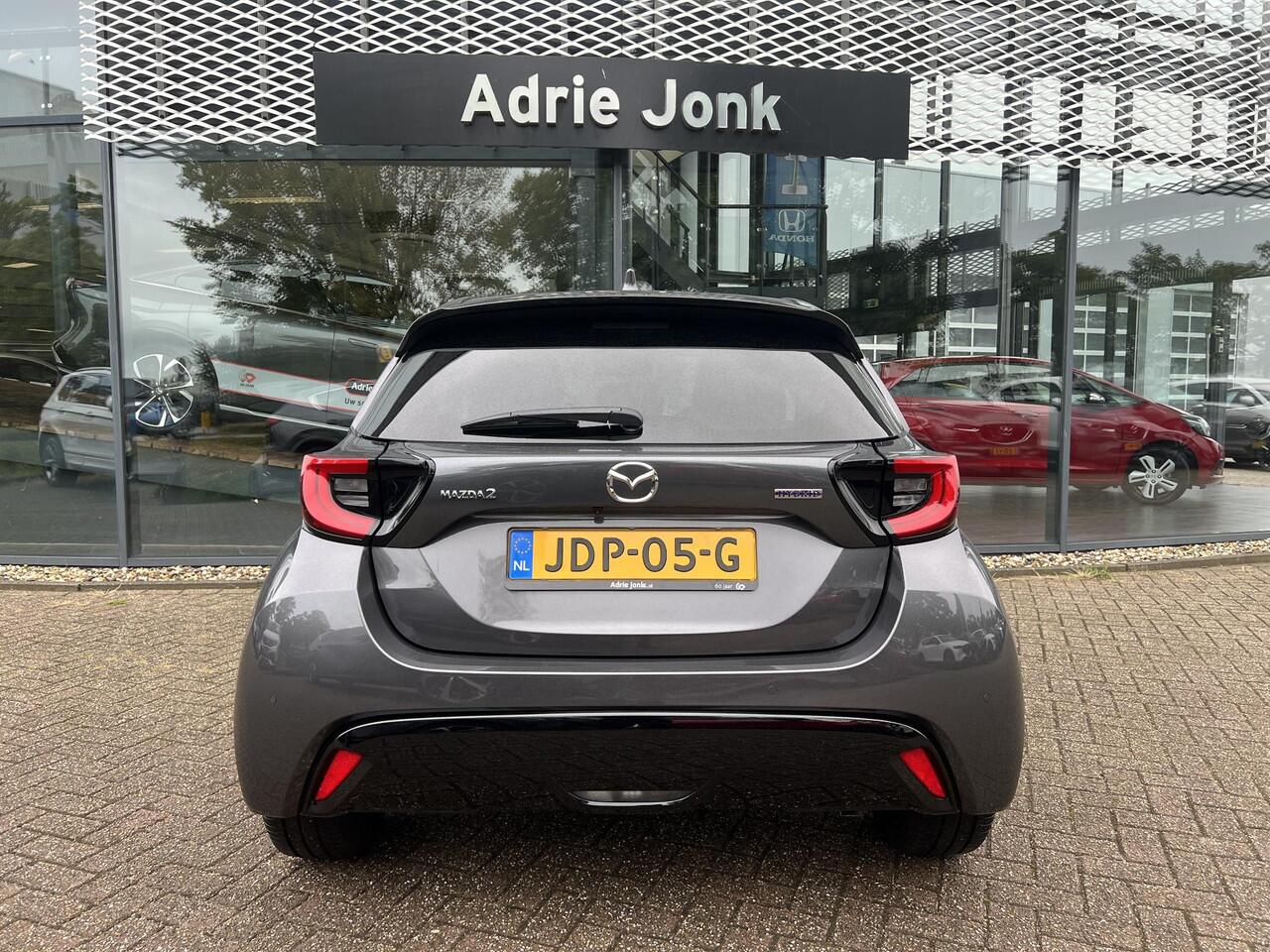Mazda 2 Hybrid 1.5 Homura Plus AUTOMAAT | STOEL- EN STUURVERWARMING | PARKEERSENSOREN V+A | ACHTERUITRIJCAMERA | DODEHOEKDETECTIE | NAVIGATIE | CARPLAY | DRAADLOZE TELEFOONLADER | DIGITAAL DASHBOARD | KEYLESS |