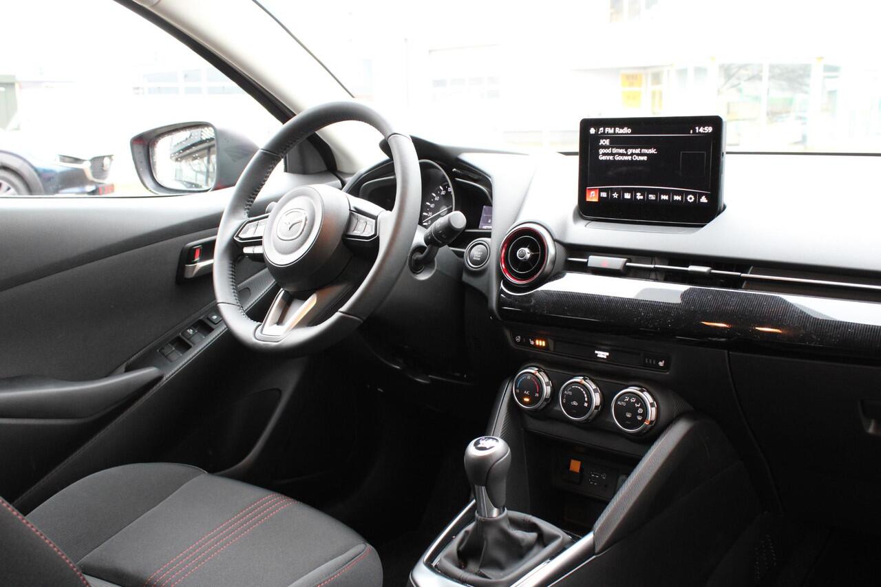 Mazda 2 1.5 e-SkyActiv-G 90 Homura , Demovoordeel ¤3.640-, Apple Carplay, LMV 16 Inch, Camera, PDC, Clima, Cruise, Stuur/Stoelverwarming, BSM, LKA