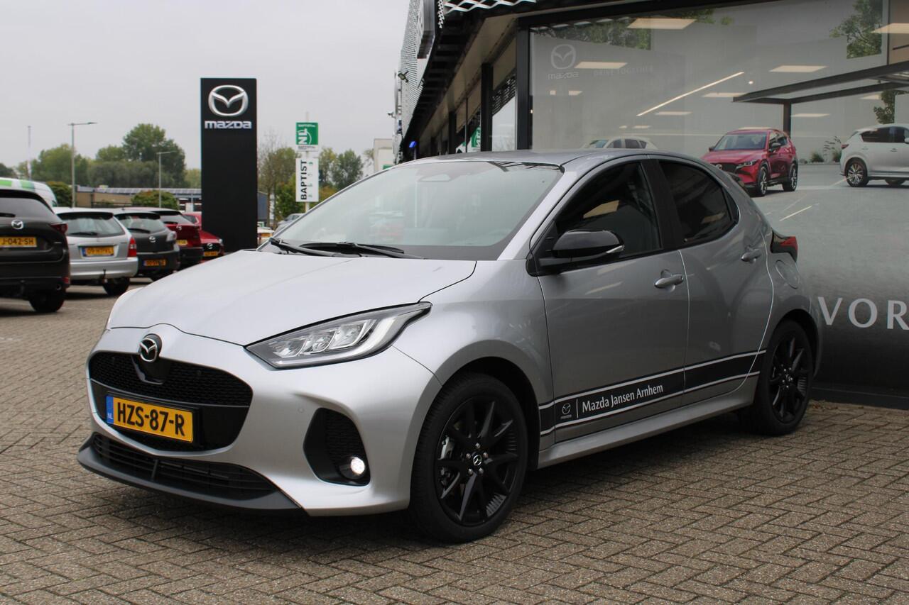 Mazda 2 Hybrid 1.5 Homura , Demovoordeel ¤ 4.490,-, Automaat, Apple Carplay, Clima, Adap.Cruise, LMV 17 Inch, Camera, PDC, Stuur/Stoelverwarming