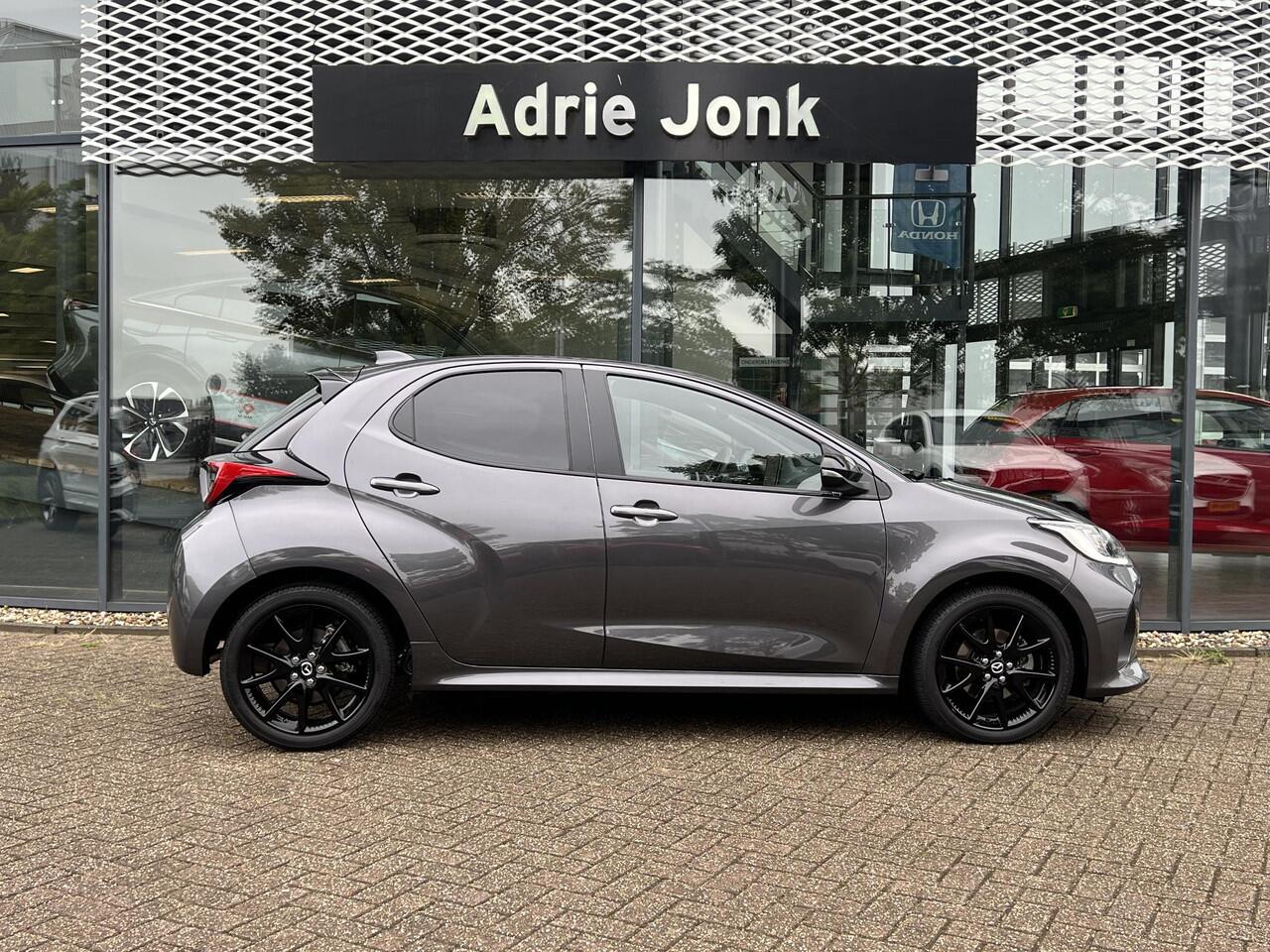 Mazda 2 Hybrid 1.5 Homura Plus AUTOMAAT | STOEL- EN STUURVERWARMING | PARKEERSENSOREN V+A | ACHTERUITRIJCAMERA | DODEHOEKDETECTIE | NAVIGATIE | CARPLAY | DRAADLOZE TELEFOONLADER | DIGITAAL DASHBOARD | KEYLESS |