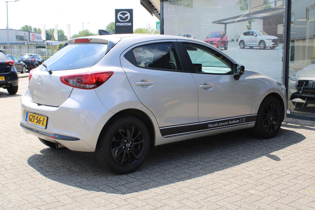 Mazda 2 1.5 e-SkyActiv-G 90 Homura Demovoordeel ¤4.140 -, Apple Carplay, LMV 16 Inch, Camera, PDC, Clima, Cruise, Stuur/Stoelverwarming, BSM, LKA
