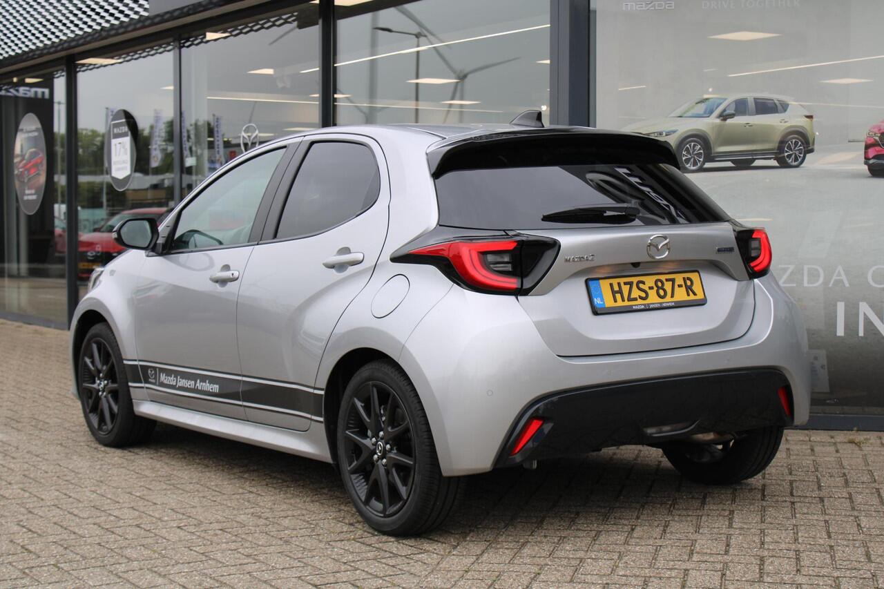 Mazda 2 Hybrid 1.5 Homura , Demovoordeel ¤ 4.490,-, Automaat, Apple Carplay, Clima, Adap.Cruise, LMV 17 Inch, Camera, PDC, Stuur/Stoelverwarming