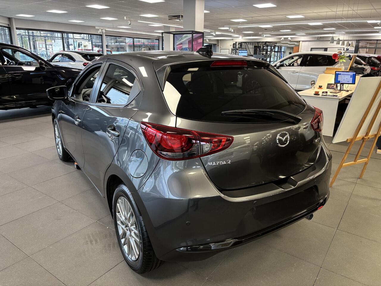 Mazda 2 1.5 e-SkyActiv-G 90 Homura , Voorraadvoordeel ¤ 1.350-, Apple Carplay, LMV 16 Inch, Camera, PDC, Clima, Cruise, Stuur/Stoelverwarming, BSM,