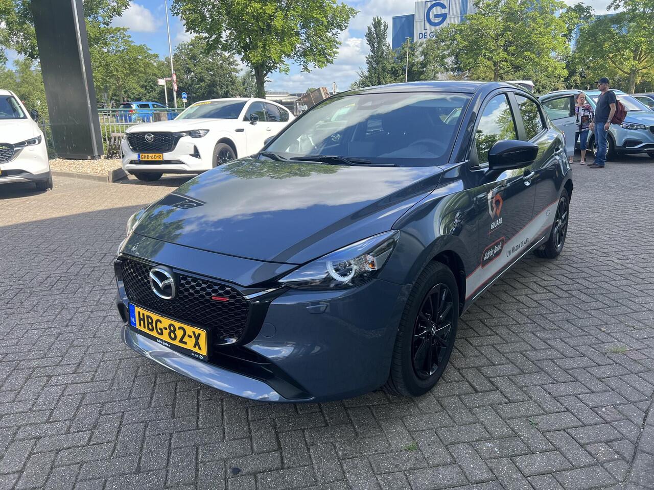 Mazda 2 1.5 e-SkyActiv-G 90 Homura | APPLE CARPLAY | DODEHOEK DETECTIE | 16 INCH LM | STOELVERWARMING | AIRCO AUTOMATISCH | DEMO | * 6 JAAR FABRIEKSGARANTIE |